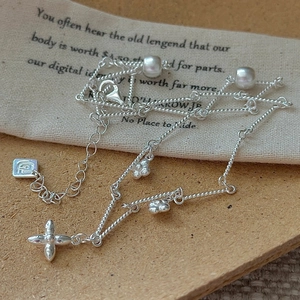 Elegant S925 sterling silver floral necklace with star pendant on a rope chain