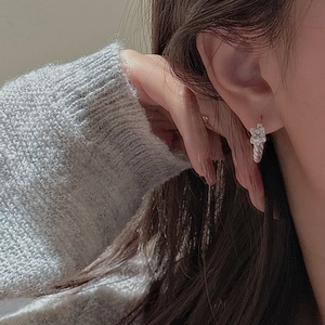 S925 sterling silver twisted hoop earring with square zircon on model for women