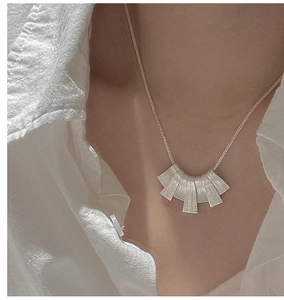 Detailed close-up of S925 sterling silver necklace with five textured rectangular plates