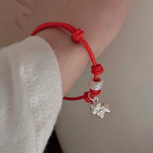 S925 sterling silver red cord bracelet with horse pendant on wrist for New Year luck