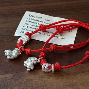 Adjustable S925 sterling silver red braided rope bracelet with cat charm and spiral rings