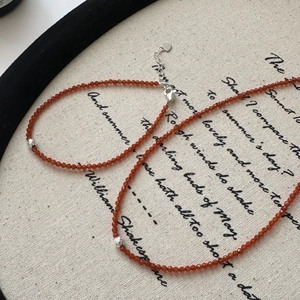 Collier vintage en argent S925 avec perles orange facettées et extension à breloque coeur
