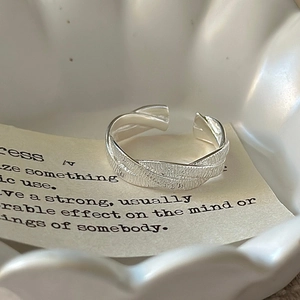 Handcrafted S925 sterling silver open ring with unique hammered texture in a minimalist style
