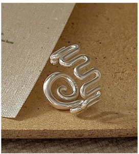 Macro shot of S925 sterling silver ring showing wavy texture and engraved hallmark