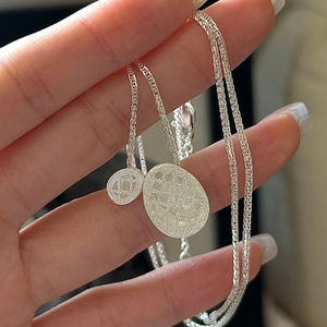 S925 Sterling Silver necklace featuring textured geometric pendants on a Chopin chain
