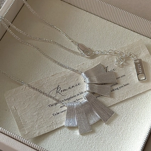 S925 sterling silver necklace with five textured rectangular pendants on a fine chain