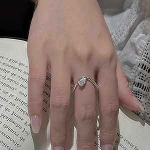 S925 sterling silver ring with pear-cut crystal on a minimalist V-shaped band