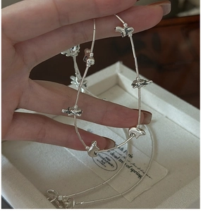 Detail of S925 sterling silver chain with polar bear and turtle animal charms