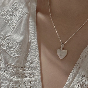 S925 sterling silver heart pendant necklace with starburst engraving and brushed finish