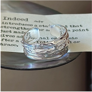 Macro detail of S925 sterling silver ring with unique irregular lava texture
