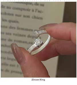 Detailed close-up of S925 sterling silver nail-shaped ring with sparkling zircon stones