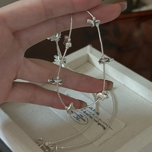 S925 sterling silver animal charm necklace featuring turtles and bears on a fabric box
