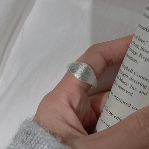 Minimalist S925 sterling silver wide ring with brushed texture on female hand