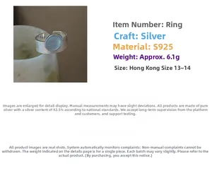 Macro detail of S925 sterling silver ring featuring aquamarine gemstone and matte finish
