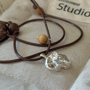 S925 sterling silver elephant pendant necklace with brown woven cord and wood beads