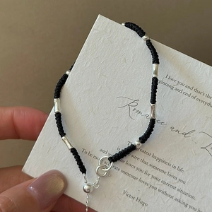 Minimalist S925 sterling silver woven black rope bracelet with bamboo style metal tubes