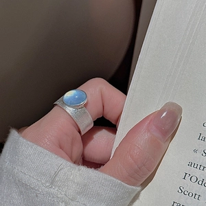 Vintage S925 sterling silver wide ring featuring a brushed texture and blue gemstone
