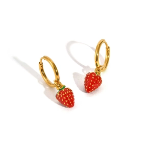 Detailed close-up of cute strawberry pendant earrings with golden hoops and red enamel finish