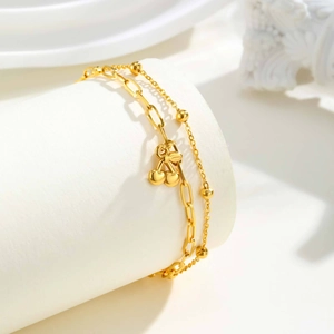 Bracelet double rang en acier inoxydable doré avec pendentif cerise et chaîne trombone