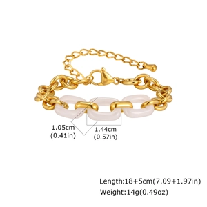 Gold stainless steel link bracelet featuring three white resin charms with extension chain