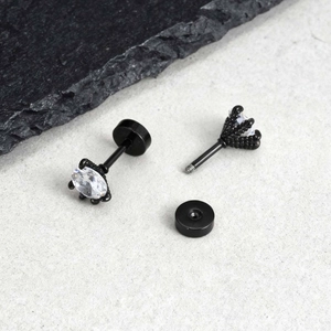 Macro shot of black claw stud earrings with cubic zirconia and screw back design