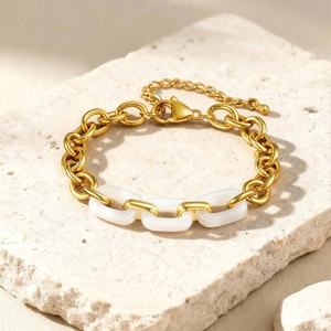 Vintage gold stainless steel chain bracelet with white resin inlay and adjustable clasp
