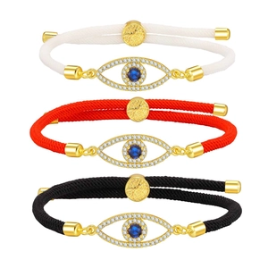 Three evil eye cord bracelets in white red and black with gold adjustable sliding clasp