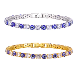 Gold and silver evil eye tennis bracelet set with blue enamel and cubic zirconia