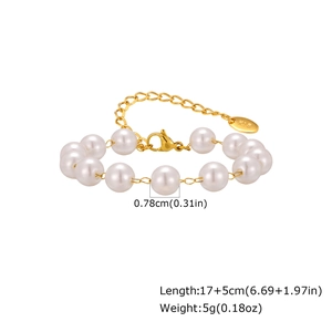 Detail of elegant pearl bracelet with adjustable golden chain and K18 metal tag
