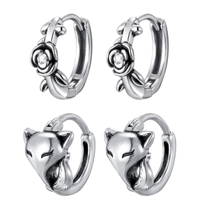 Minimalist stainless steel hoop earrings featuring rose and fox head designs with zircons