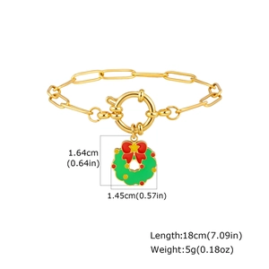 Détail du bracelet doré avec pendentif couronne de Noël, longueur 18cm et poids 5g