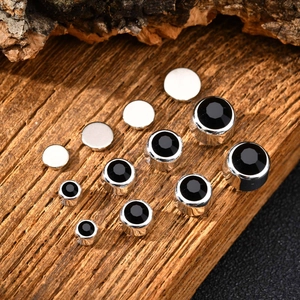 Vintage style magnetic ear stud set with black stones and silver metal base