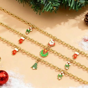 Goldene Weihnachtsarmbänder und Halsketten mit Weihnachtsmann- und Festanhängern