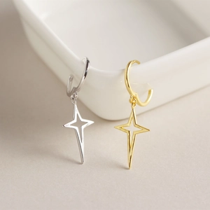 Detailed view of S925 sterling silver star hoop earrings in gold and silver finishes