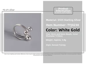 Detail of S925 sterling silver ring featuring triple polished beads and double band design