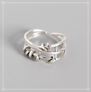 Macro view of vintage S925 sterling silver multi-layer ring with movable abacus beads