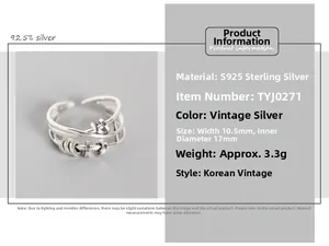 Macro shot of S925 sterling silver multi-layer crossover ring with rotating beads
