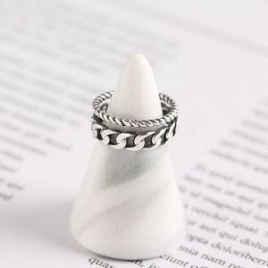 Vintage S925 sterling silver double-layered chain ring with oxidized finish on a white stand