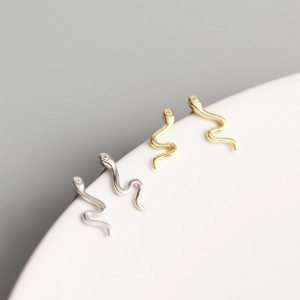 Minimalist S925 sterling silver snake earrings in gold and silver with cubic zirconia