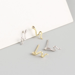Snake shaped S925 sterling silver stud earrings with sparkling cubic zirconia inlay