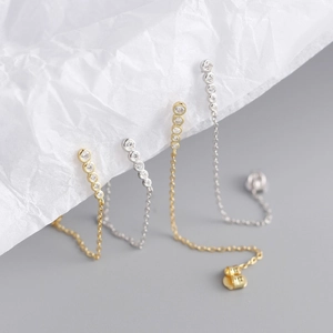 Long S925 silver fringe drop earrings with geometric row of diamonds in gold and silver