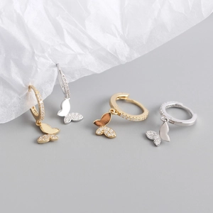Boucles d'oreilles papillon en argent S925 avec zircons cubiques en finitions or et argent