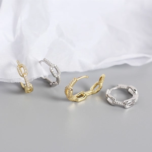 Detail of S925 sterling silver chain hoop earrings with paved cubic zirconia stones