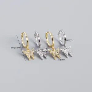 Macro detail of S925 silver butterfly earrings with CZ pave, 20.9mm total height