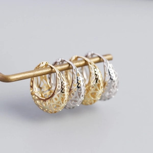 Fashionable S925 sterling silver hollow hoop earrings in gold and silver finish