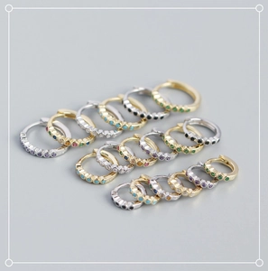 Detailed view of S925 sterling silver hoop earrings with multi-colored zircon stones