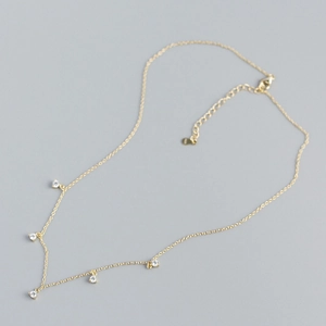 Collana minimalista in argento sterling 925 placcato oro con cinque pendenti in zircone
