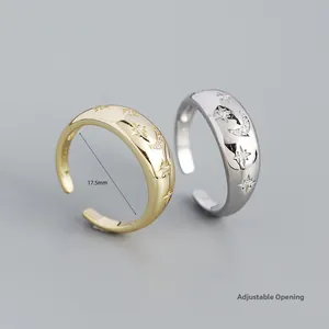 Detail of adjustable star and moon rings showing 17.5mm inner diameter and star engravings