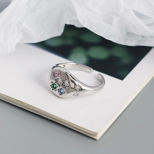 Detailed macro view of S925 silver signet ring with colorful pavé set zircon stones