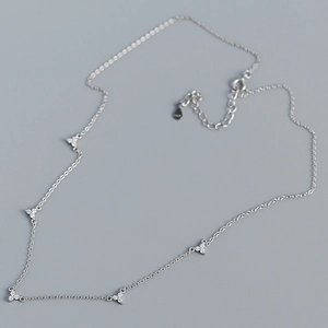 Elegant S925 sterling silver chain necklace featuring five sparkling zircon floral pendants